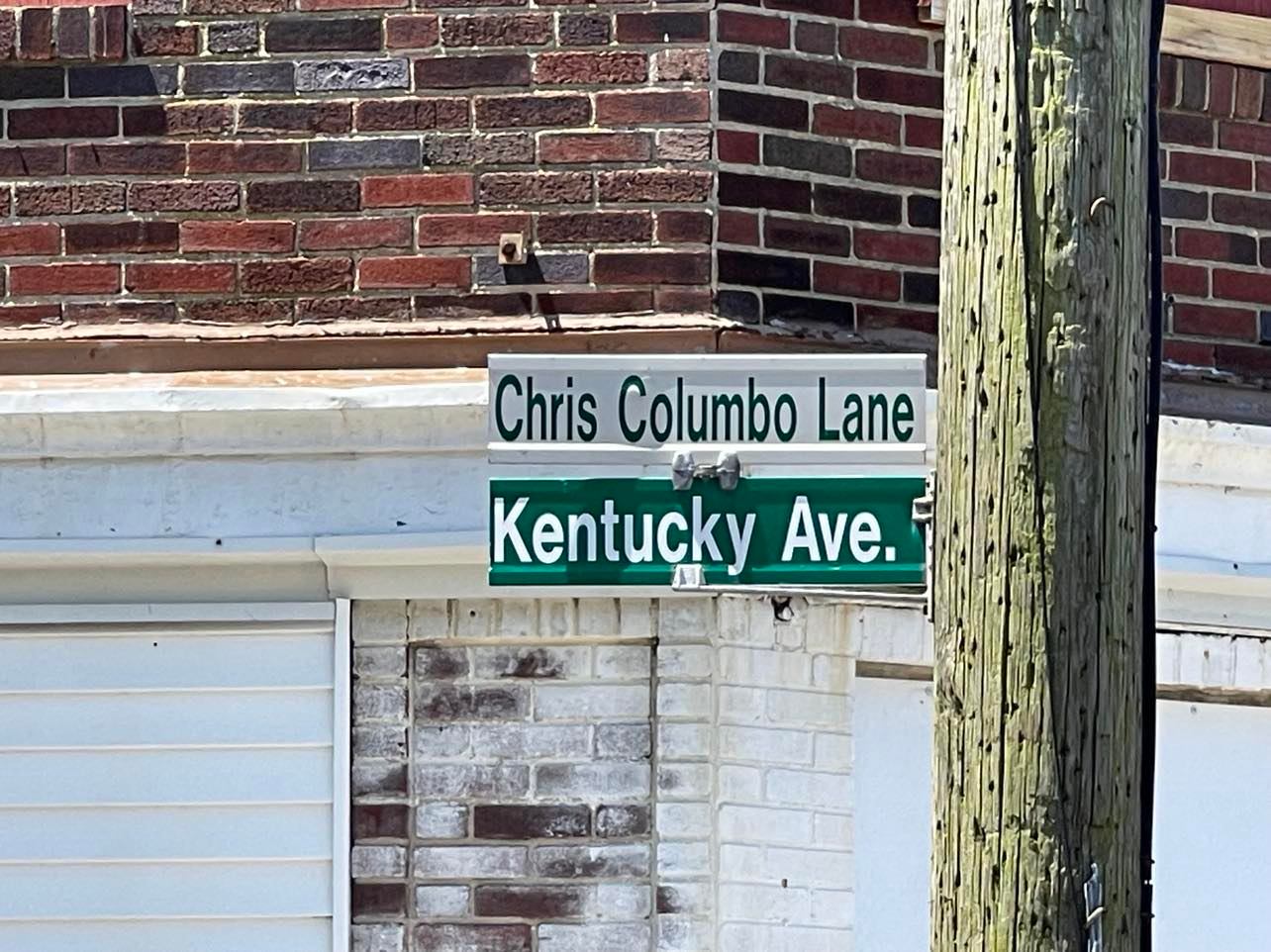 Kenutcky Avenue and Chris Colombo Lane street sign Photo Credit: Mark Tyler