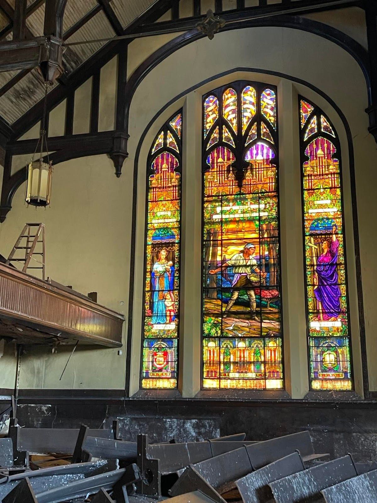 The stained glass is all that remains of the church's former glory. Photo Credit: Mark Tyler