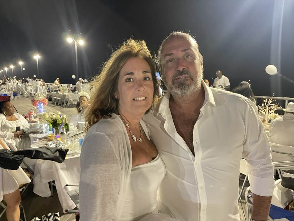 Ronnie Bloch, (Left) and her husband Cress (Right) of Reading, pa, came down to the resort for Diner en Blanc again this year. Photo Credit: Mark Tyler