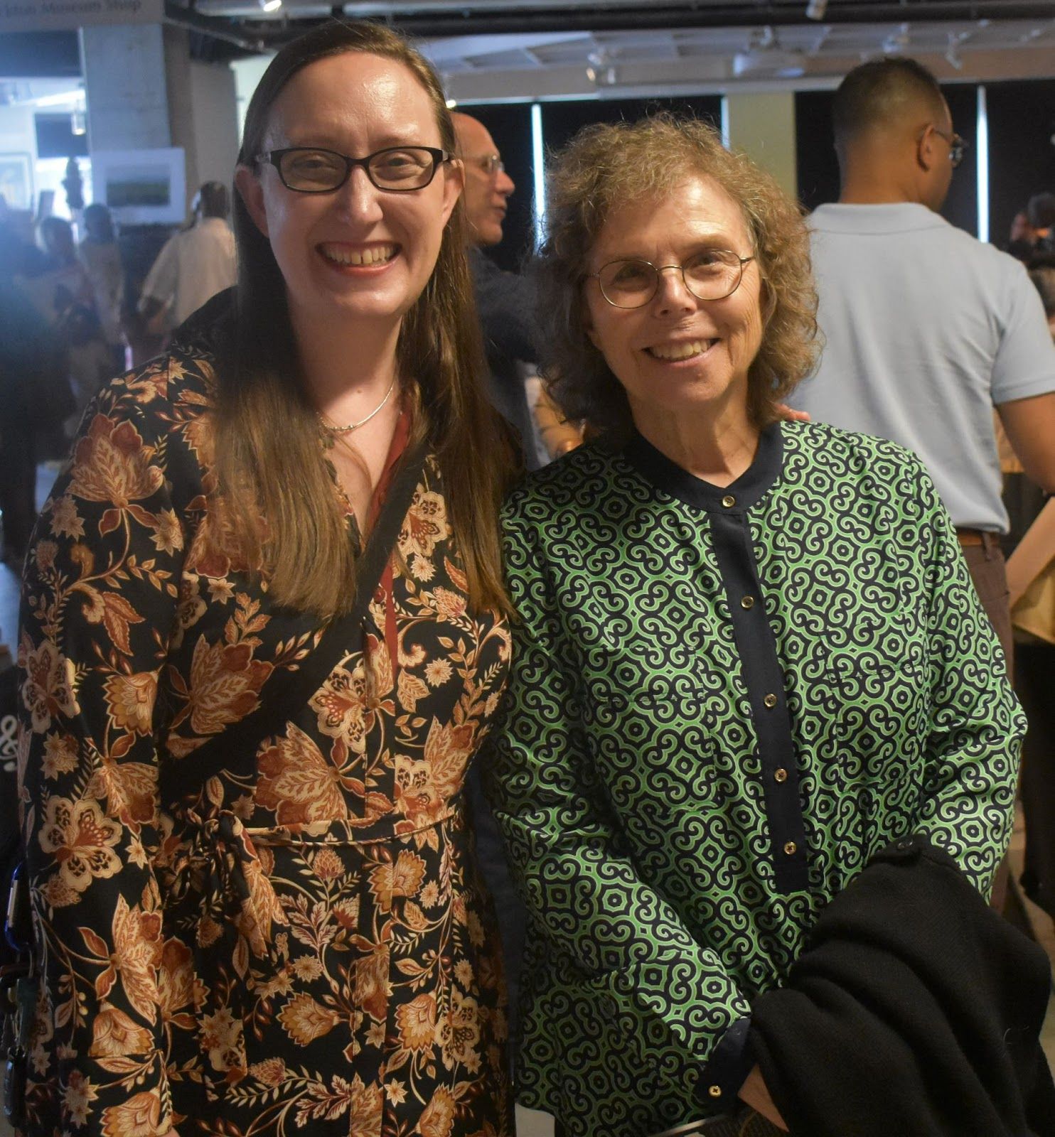 Reading is FUN as well as Fundamental! On the left is Heather Perez ,Special Collections Librarian  at The Richard E. Bjork Library in Stockton University. On the right is Maureen Frank, retired Director of The Atlantic City Free Public Library! Photo Credit: Raymond Tyler