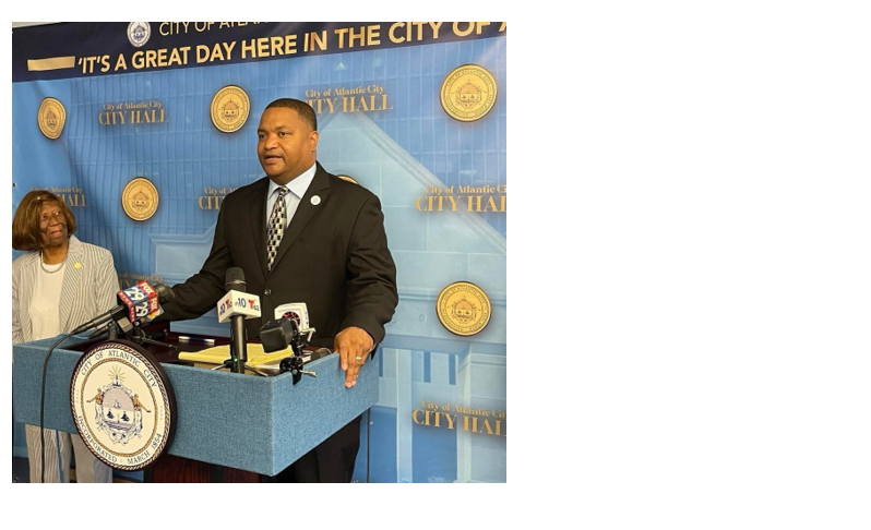 Atlantic City Mayor Marty Small, Sr. stands at a city hall podium during a press conference.