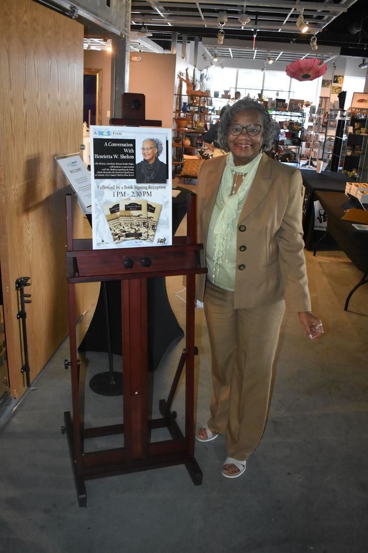 When You're Smiling! Here is The Lady Of The Day Henrietta Shelton! Picture Perfect by her sign before the events started. Ph